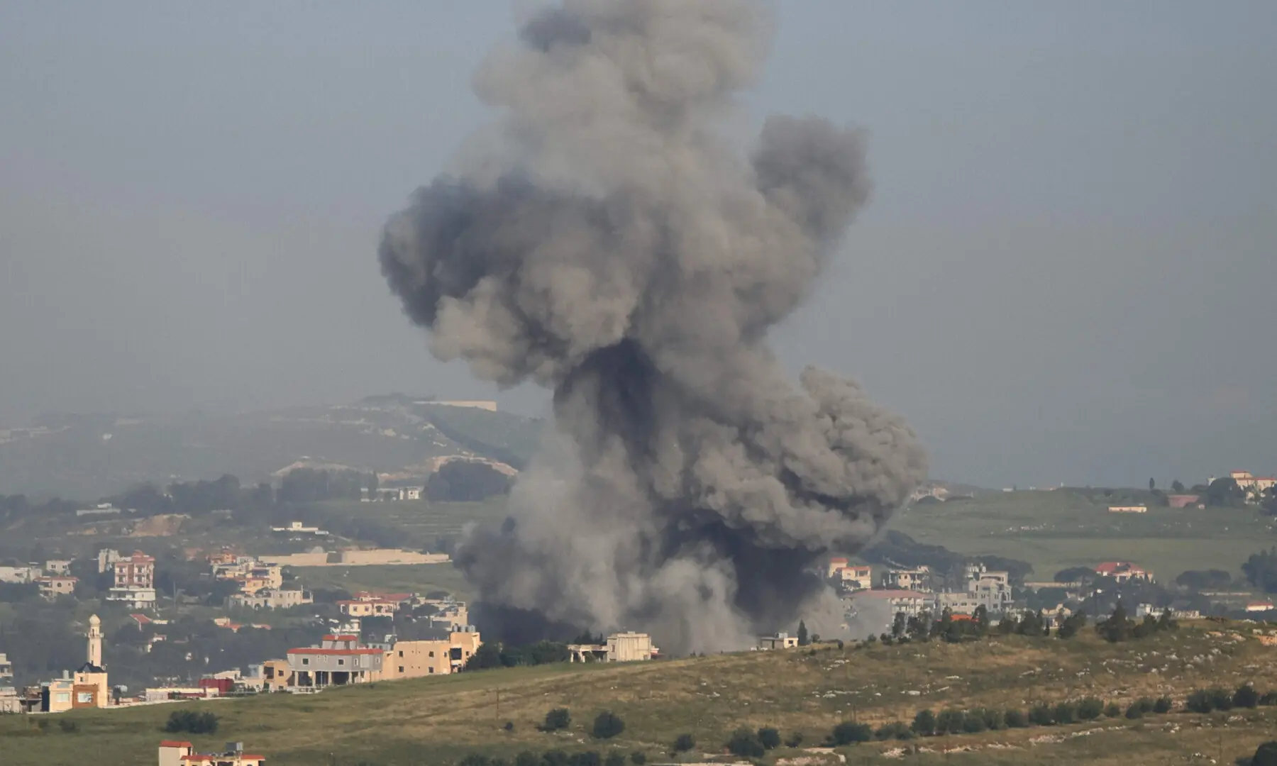 A photograph taken from the southern Lebanese area of Marjayoun shows smoke as it rises from the site of an Israeli airstrike that targeted the village of Kfar Tibnit on May 11, 2026. &mdash; AFP
