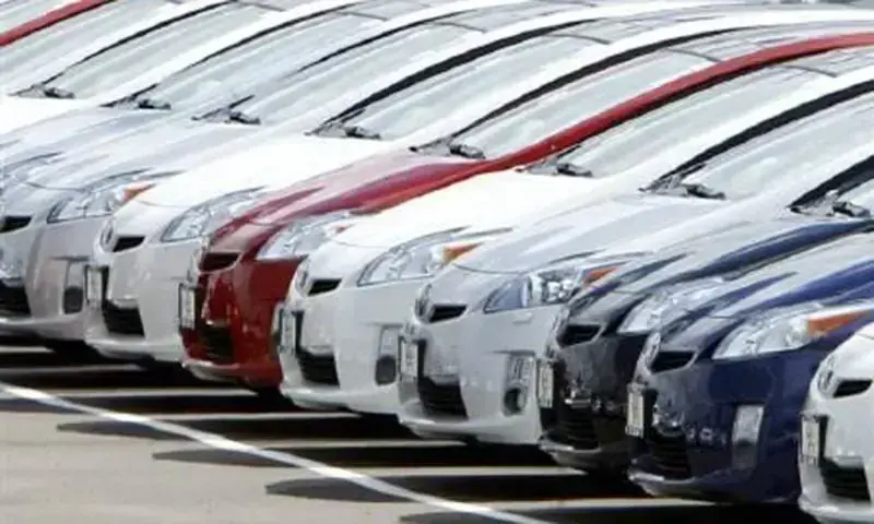 A file photo of a row of cars. &mdash;Reuters/File