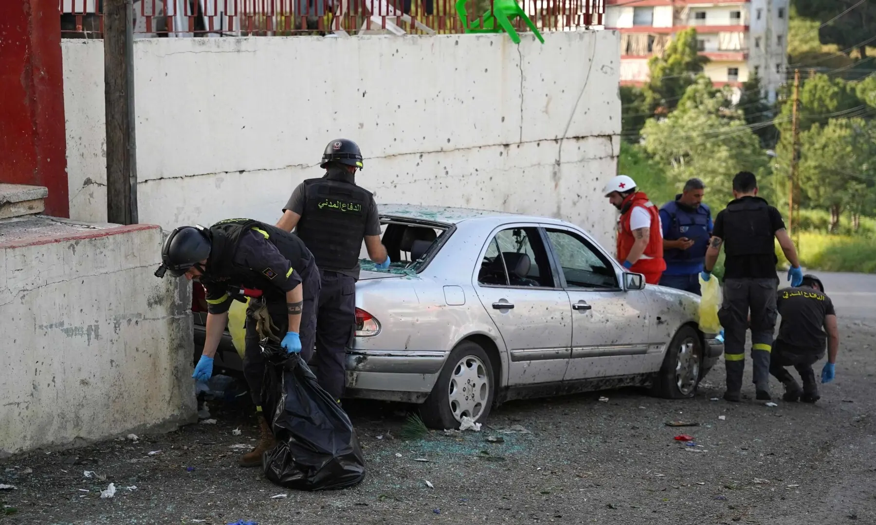 Lebanese first responders search the site of an Israeli strike that targeted first aid responders as they were attending to a wounded person in the southern Lebanese city of Nabatieh on May 12, 2026. &mdash;AFP