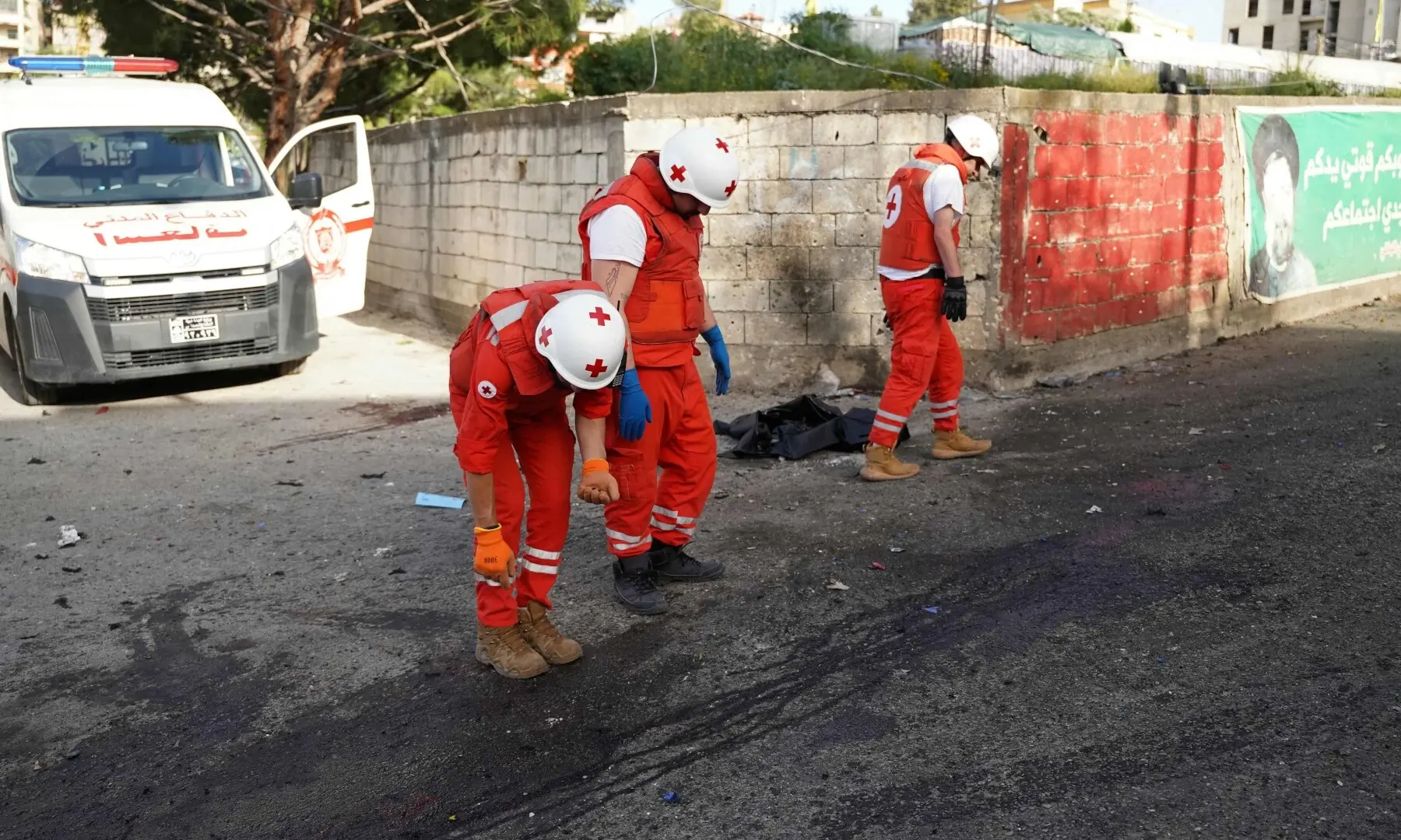 Lebanese Red Cross workers search the site of an Israeli strike that targeted first aid responders as they were attending to a wounded person in the southern Lebanese city of Nabatieh on May 12, 2026. &mdash;AFP