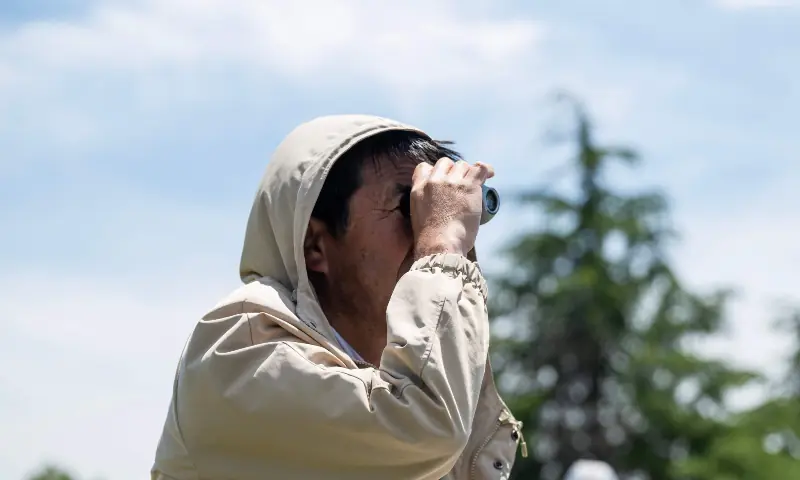 In this photo taken on May 9, 2026, a spectator watches the game during the ICC T20 World Cup East Asia-Pacific Qualifier match between Japan and Vanuatu at the Nisshin Cricket Ground at Korogi Sports Park in Nisshin, Aichi Prefecture. — AFP