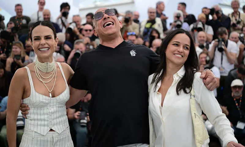 (FROM left) Actress Jordana Brewster, actor and filmmaker Vin Diesel, and actress Michelle Rodriguez pose during a preview of The Fast and the Furious at the Cannes Film Festival.—AFP (FROM left) Actress Jordana Brewster, actor and filmmaker Vin Diesel, and actress Michelle Rodriguez pose during a preview of The Fast and the Furious at the Cannes Film Festival.—AFP