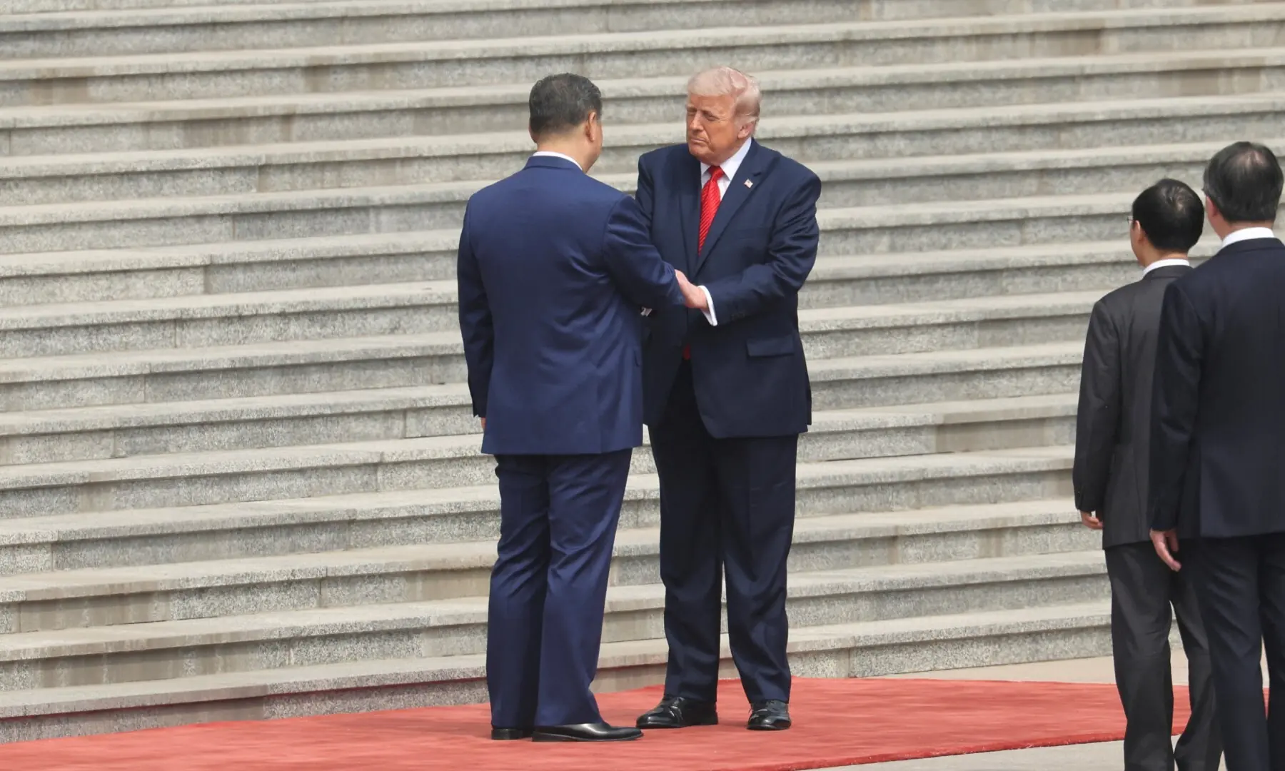 Chinese President Xi Jinping greets US President Donald Trump during a welcome ceremony at the Great Hall of the People, in Beijing, China, May 14, 2026. &mdash; Reuters