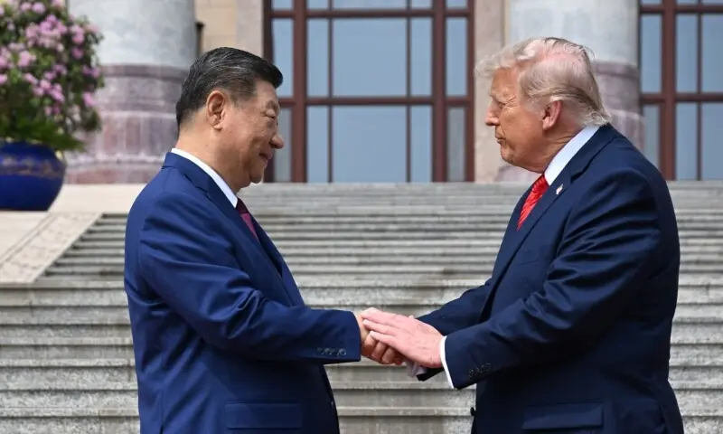 US President Donald Trump (R) shakes hands with China's President Xi Jinping at the Great Hall of the People in Beijing on May 14, 2026. — AFP US President Donald Trump (R) shakes hands with China's President Xi Jinping at the Great Hall of the People in Beijing on May 14, 2026. — AFP