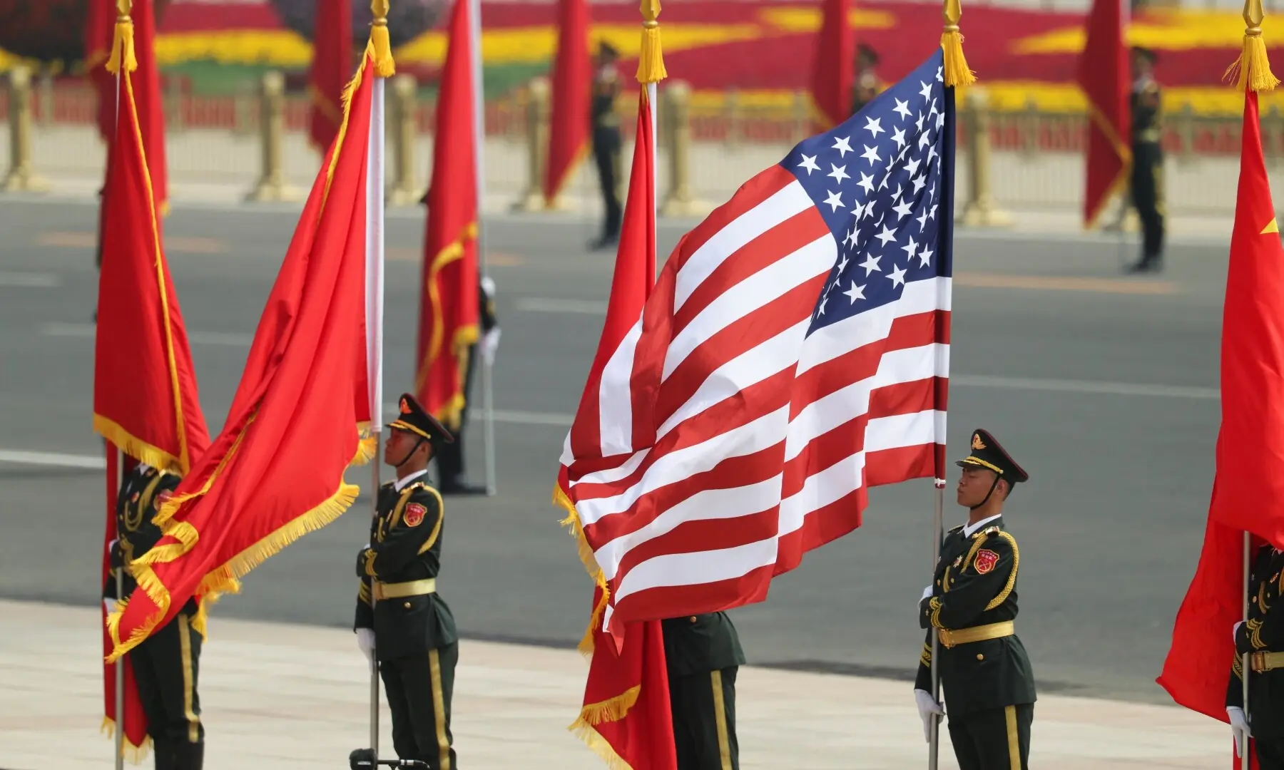 Chinese People&rsquo;s Liberation Army (PLA) honour guards hold flags on the day of the welcome ceremony for US President Donald Trump by Chinese President Xi Jinping at the Great Hall of the People in Beijing, China May 14, 2026. &mdash;Reuters