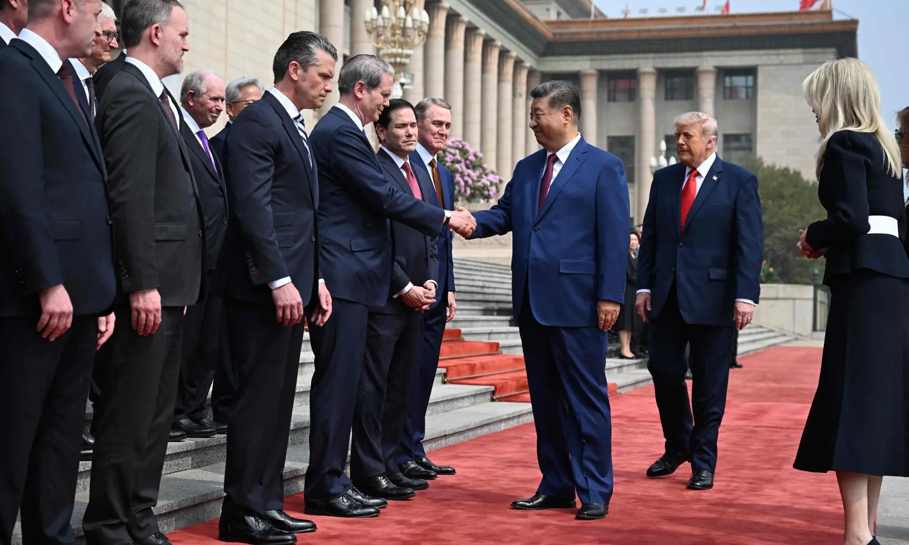 China&rsquo;s President Xi Jinping (C) shakes hands with US Treasury Secretary Scott Bessent as US President Donald Trump (2nd R) looks on during a welcome ceremony at the Great Hall of the People in Beijing on May 14, 2026. &mdash;AFP