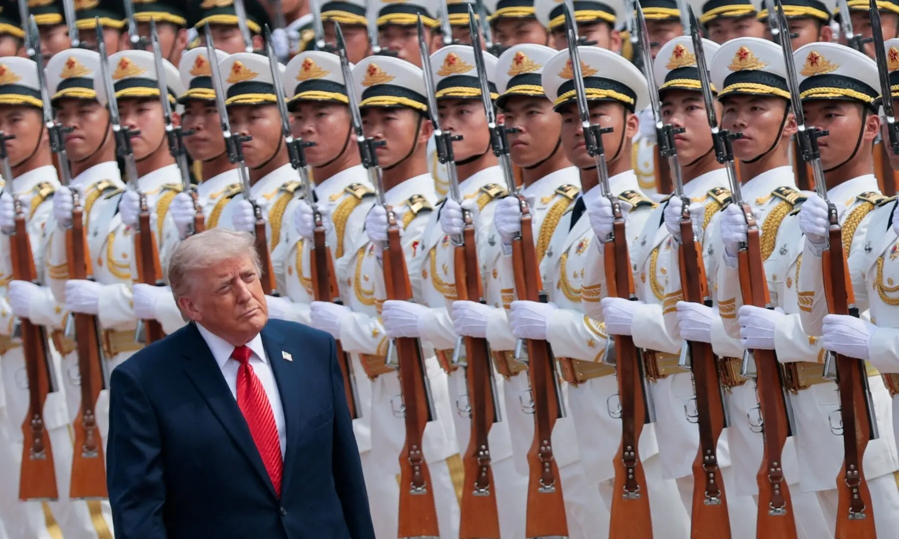 US President Donald Trump inspects an honour guard during a welcome ceremony with Chinese President Xi Jinping (not pictured) at the Great Hall of the People in Beijing, China, May 14, 2026. &mdash;Reuters