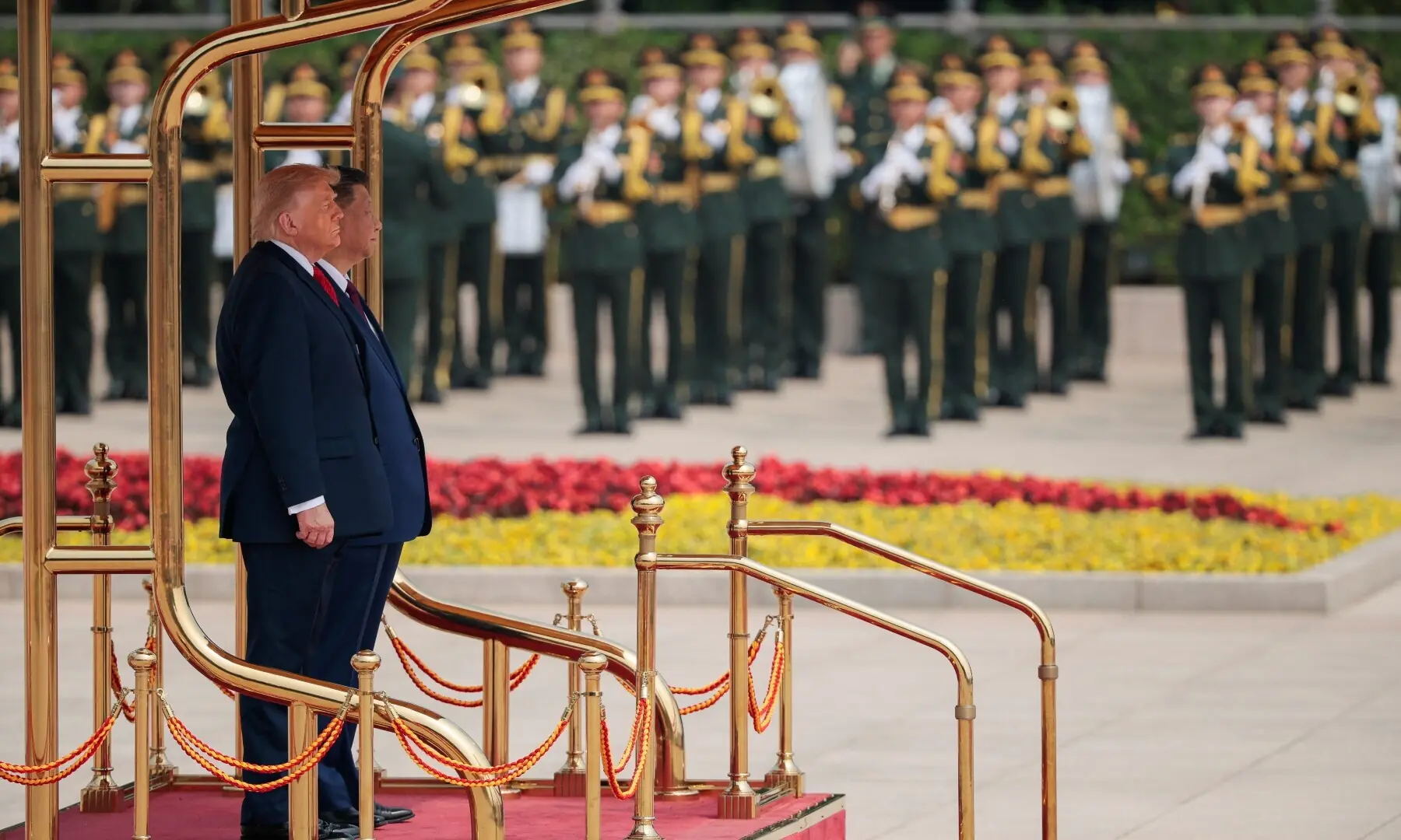 US President Donald Trump participates in a welcome ceremony with Chinese President Xi Jinping at the Great Hall of the People in Beijing, China, May 14, 2026. &mdash;Reuters