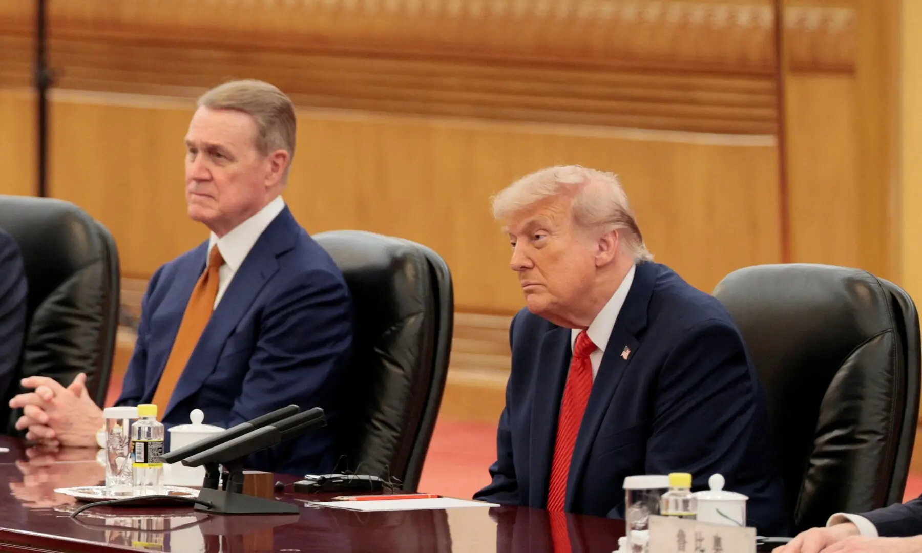U.S. President Donald Trump and US Ambassador to China David Perdue participate in an expanded bilateral meeting with Chinese President Xi Jinping (not pictured) at the Great Hall of the People in Beijing, China, May 14, 2026. &mdash;Reuters