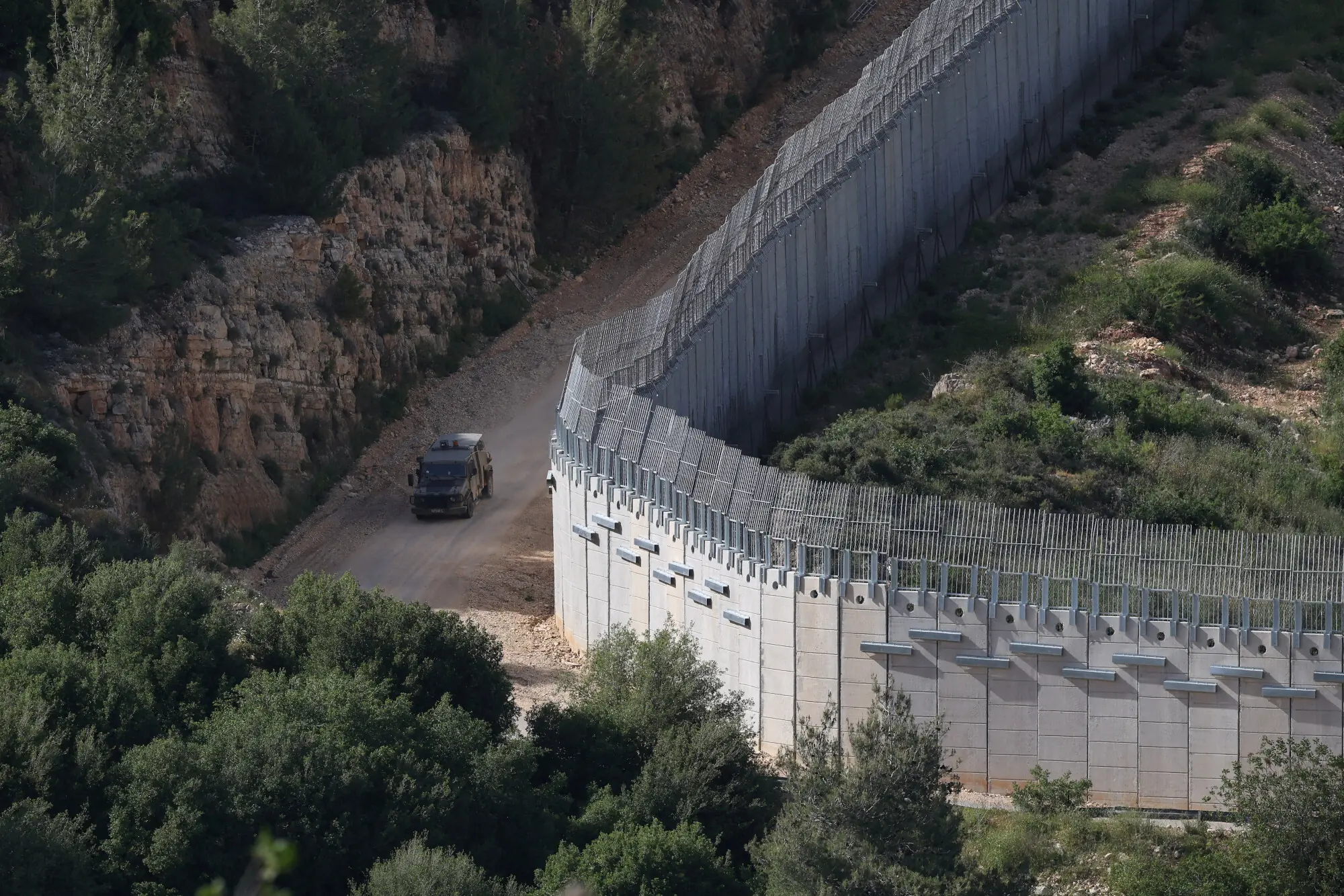 An Israeli military vehicle operates by the Israeli Lebanese border, in northern Israel, May 14, 2026. &mdash;Reuters