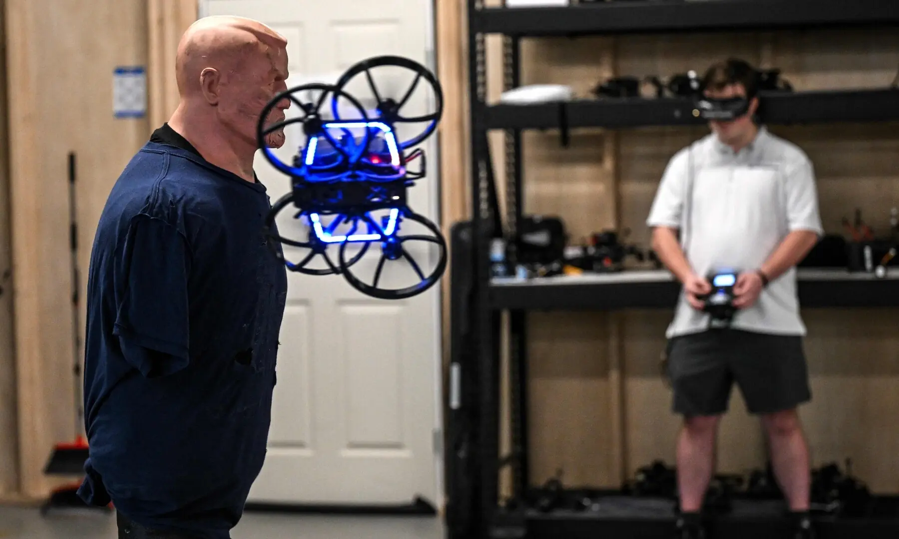 A drone flies around a mannequin with flashing lights during a demonstration of how to neutralise a shooter at a school, held at the headquarters of the startup Campus Guardian Angel, on May 8, 2026, in Austin, Texas. &mdash; AFP
