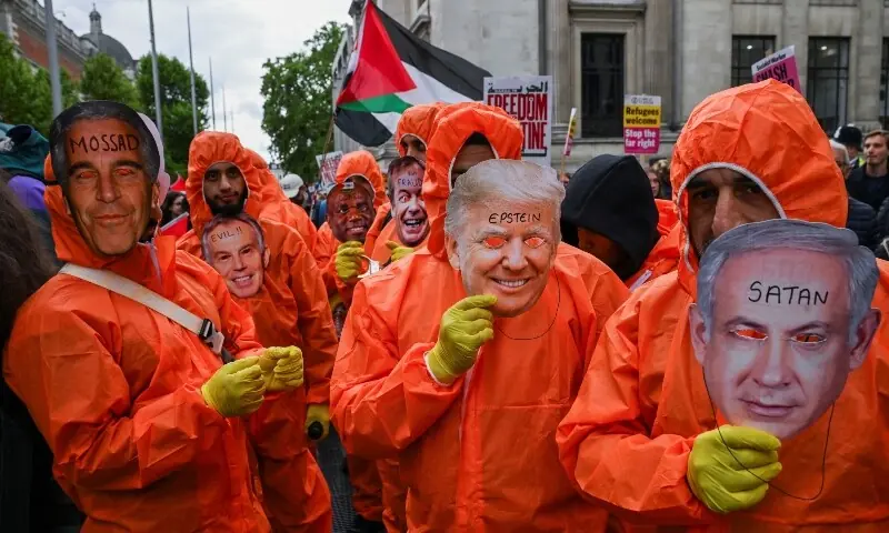 People with masks of US President Donald Trump, Israel's PM Benjamin Netanyahu, Jeffrey Epstein, Britain's former PM Tony Blair, Reform UK Leader Nigel Farage and Justice Secretary David Lammy as demonstrators from the Palestine Solidarity Campaign hold a march to mark the 78th anniversary of the Nakba and against the &ldquo;Unite the Kingdom&rdquo; rally taking place in London organised by British anti-immigration activist Tommy Robinson, in London, Britain, May 16, 2026. REUTERS/Chris J Ratcliffe