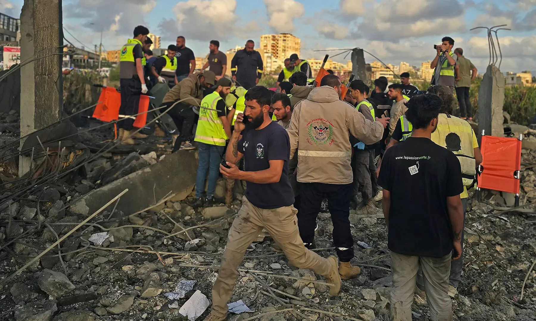 First responders gather at the site of an Israeli airstrike that targeted an area in the suburbs of the southern Lebanese coastal city of Tyre on May 16, 2026. &mdash; AFP