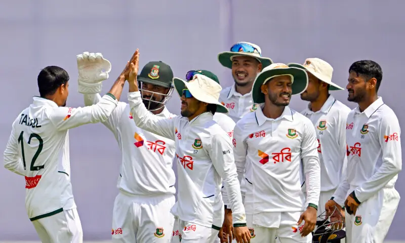 Bangladesh’s Taijul Islam (L) celebrates with teammates after taking the wicket of Pakistan’s Salman Agha during the second day of the second Test cricket match between Bangladesh and Pakistan at the Sylhet International Cricket Stadium in Sylhet on May 17, 2026. — AFP Bangladesh’s Taijul Islam (L) celebrates with teammates after taking the wicket of Pakistan’s Salman Agha during the second day of the second Test cricket match between Bangladesh and Pakistan at the Sylhet International Cricket Stadium in Sylhet on May 17, 2026. — AFP
