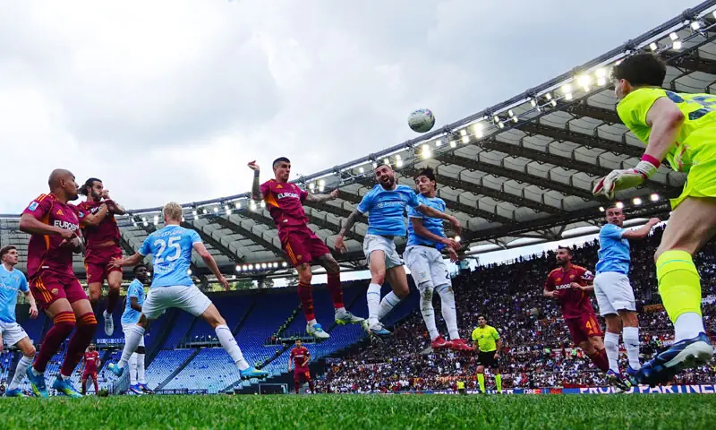 ROME: AS Roma’s Gianluca Mancini (C) heads to score during the Serie A match against Lazio at Stadio Olimpico on Sunday. —Reuters ROME: AS Roma’s Gianluca Mancini (C) heads to score during the Serie A match against Lazio at Stadio Olimpico on Sunday. —Reuters