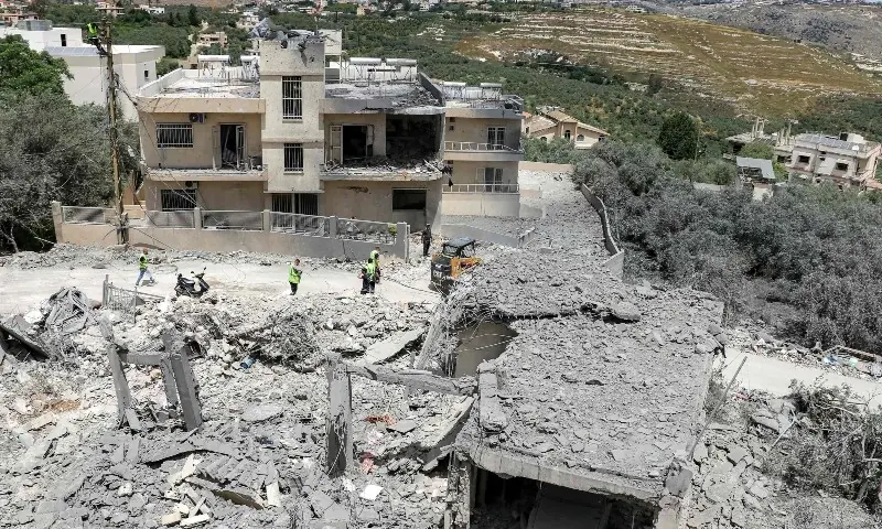 First responders inspect damage following Israeli bombardment on the village of Deir Qanoun al-Nahr in southern Lebanon on May 17, 2026. &mdash; AFP