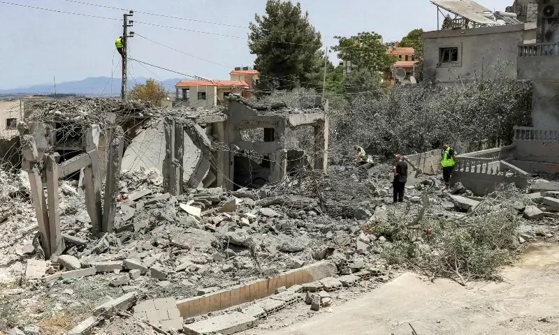 First responders inspect damage following Israeli bombardment on the village of Deir Qanoun al-Nahr in southern Lebanon on May 17, 2026. &mdash; AFP