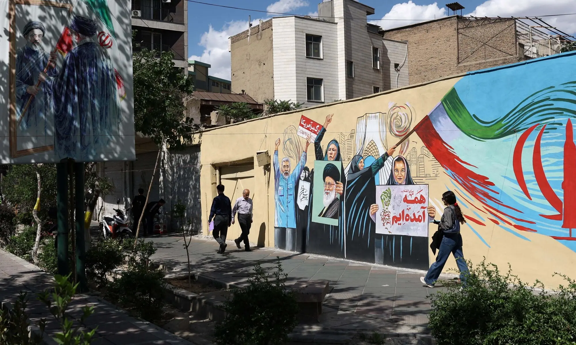 People walk on a street near a mural featuring an image of the late Supreme Leader of Iran, Ayatollah Ali Khamenei, in Tehran, Iran, May 18, 2026. — Reuters People walk on a street near a mural featuring an image of the late Supreme Leader of Iran, Ayatollah Ali Khamenei, in Tehran, Iran, May 18, 2026. — Reuters