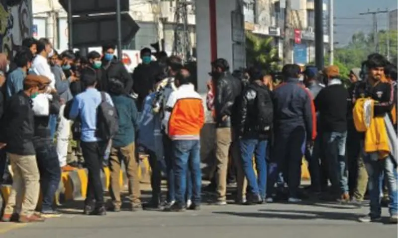 Metro bus staff hold a protest at Kalma Chowk against non-payment of salaries. — White Star/File Metro bus staff hold a protest at Kalma Chowk against non-payment of salaries. — White Star/File