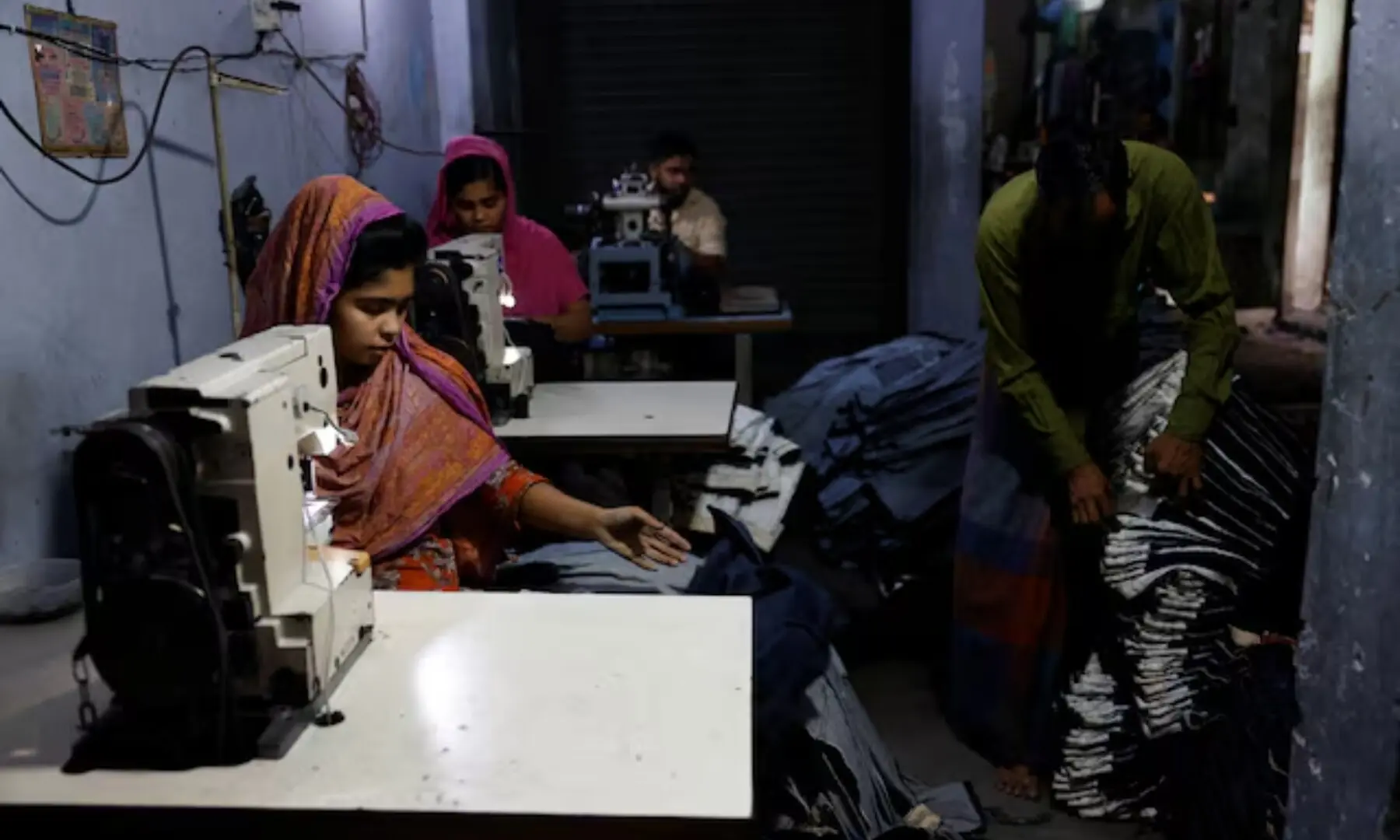 Bangladeshi garment workers make clothing in the sewing section of a factory in Gazipur, Bangladesh, April 9, 2025—Reuters/File Bangladeshi garment workers make clothing in the sewing section of a factory in Gazipur, Bangladesh, April 9, 2025—Reuters/File