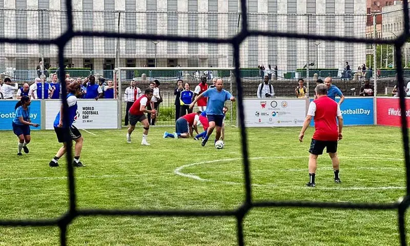 Diplomats, former players and UN staff play a friendly match at an event marking World Football Day at the United Nations in New York, the US on May 20, 2026. — Photo via author
