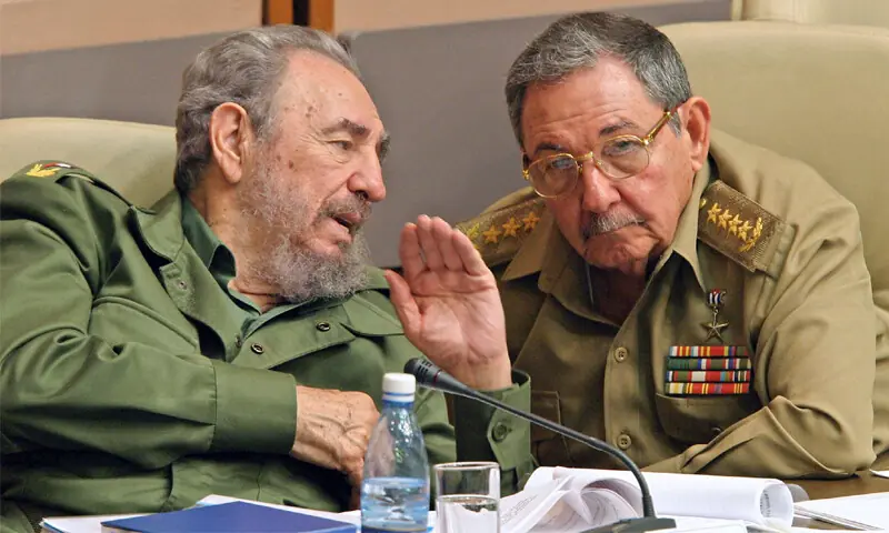 former Cuban president Raul Castro (right) has been charged over downing of planes in 1996.—AFP / file former Cuban president Raul Castro (right) has been charged over downing of planes in 1996.—AFP / file