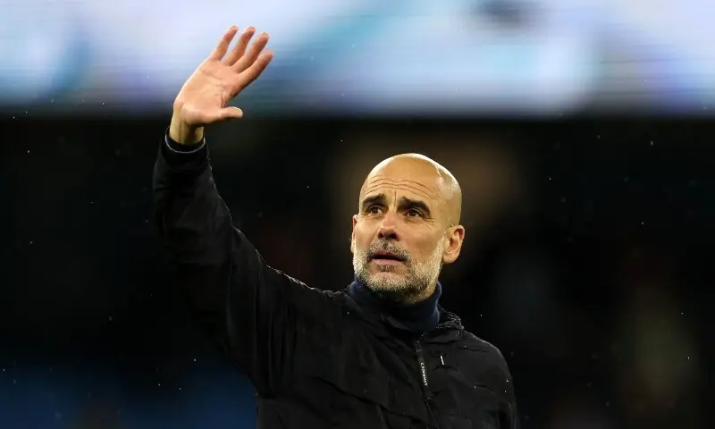 Manchester City's Spanish manager Pep Guardiola waves to the fans following the English Premier League football match between Manchester City and Crystal Palace at the Etihad Stadium in Manchester, north west England, on May 13. &mdash;AFP/File