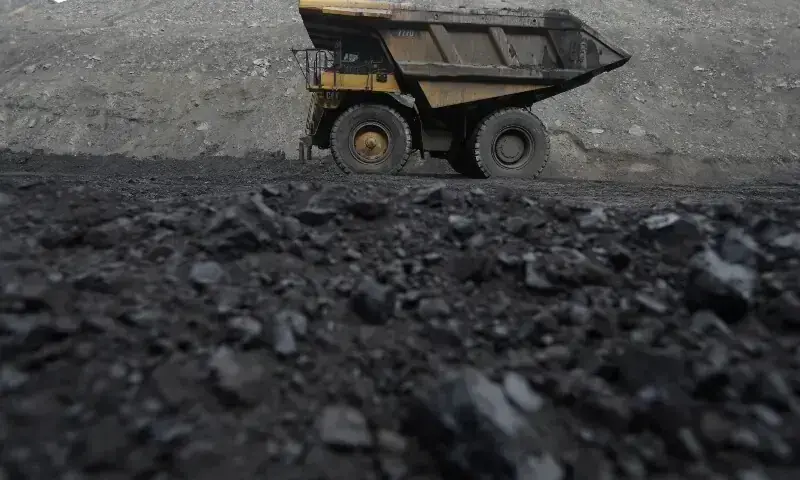 This image shows dump trucks haul coal and sediment at a coal mine. — Reuters/File This image shows dump trucks haul coal and sediment at a coal mine. — Reuters/File
