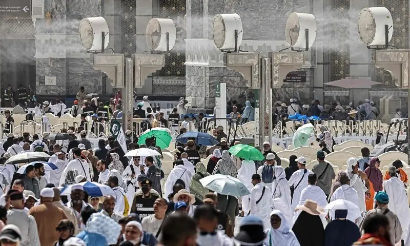 Muslim worshippers walk along the Grand Mosque complex under the water-mist fans installed in the holy city of Makkah on May 22, 2026 ahead of the annual Haj pilgrimage. —AFP/File Muslim worshippers walk along the Grand Mosque complex under the water-mist fans installed in the holy city of Makkah on May 22, 2026 ahead of the annual Haj pilgrimage. —AFP/File