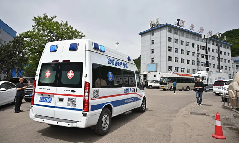 An ambulance arrives to carry out rescue operations following the gas explosion at Liushenyu coal mine in Changzhi.&mdash;AFP