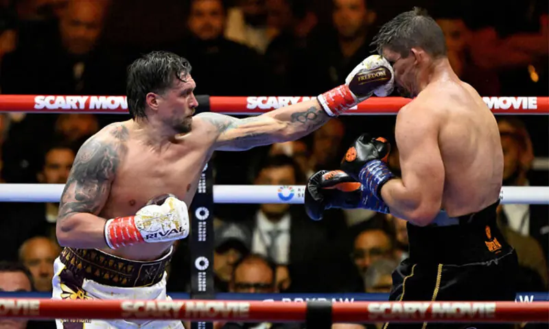 UKRAINE’S Oleksandr Usyk lands a punch on Rico Verhoeven of the Netherlands during their WBC World Heavyweight Championship fight at the Pyramids of Giza.—AFP UKRAINE’S Oleksandr Usyk lands a punch on Rico Verhoeven of the Netherlands during their WBC World Heavyweight Championship fight at the Pyramids of Giza.—AFP