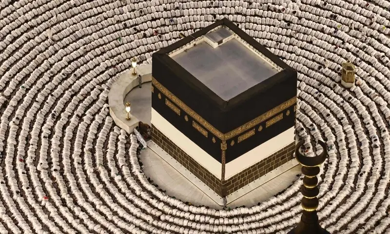 Muslims perform the evening prayer around Kaaba at Grand Mosque complex on May 24, 2026, ahead of the annual Haj pilgrimage. — AFP Muslims perform the evening prayer around Kaaba at Grand Mosque complex on May 24, 2026, ahead of the annual Haj pilgrimage. — AFP
