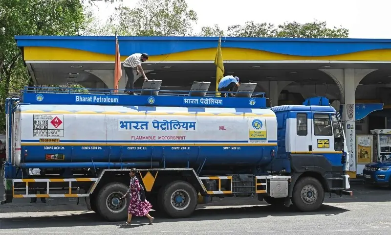 Workers offload fuel from a Bharat Petroleum Corporation tanker at a gas station in Hyderabad on May 25, 2026, following a fuel price hike amid global energy crises triggered by the Middle East war. —AFP Workers offload fuel from a Bharat Petroleum Corporation tanker at a gas station in Hyderabad on May 25, 2026, following a fuel price hike amid global energy crises triggered by the Middle East war. —AFP