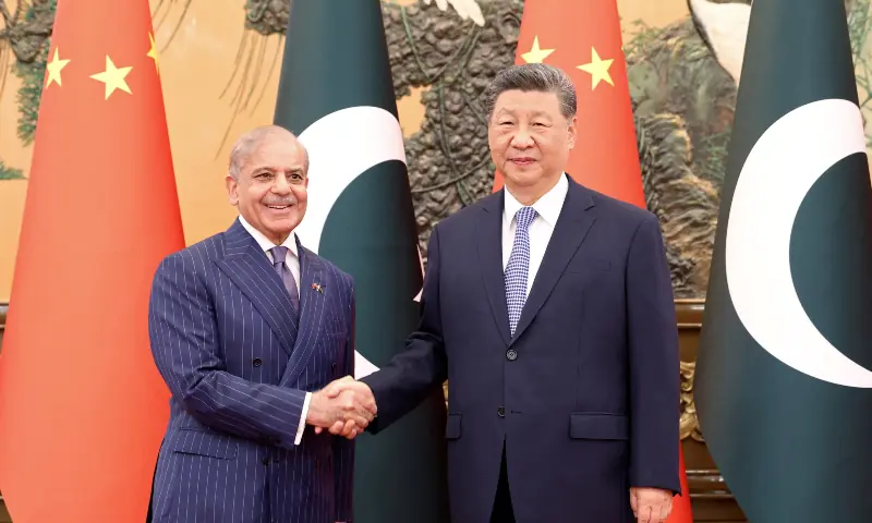 Prime Minister Shehbaz Sharif and Chinese President Xi Jinping shake hands at the Great Hall of the People in Beijing, China on May 25, 2026. &mdash; via Reuters