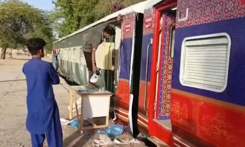 ONE coach of the ‘Ho Jamalo’ train is painted as per the prescribed colour scheme while another one is in queue at the Sukkur railway station on Monday.—Dawn ONE coach of the ‘Ho Jamalo’ train is painted as per the prescribed colour scheme while another one is in queue at the Sukkur railway station on Monday.—Dawn
