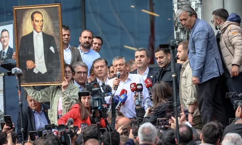 Republican People's Party (CHP) leader Ozgur Ozel (C) adresses a statement after a police raid on the party headquarters in Ankara, Turkiye on May 24, 2026. — AFP Republican People's Party (CHP) leader Ozgur Ozel (C) adresses a statement after a police raid on the party headquarters in Ankara, Turkiye on May 24, 2026. — AFP