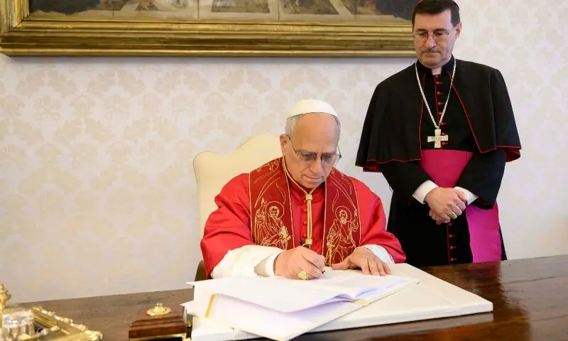 The photo shows Pope Leo XIV signing his first Encyclical Letter &ldquo;Magnifica Humanitas&rdquo;, focused on the rise of artificial intelligence, in The Vatican. &mdash; AFP