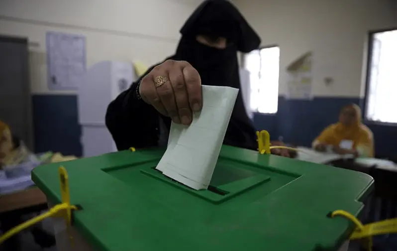 A woman casts her vote at a polling station during the general election in Islamabad on July 25, 2018. — Reuters/File A woman casts her vote at a polling station during the general election in Islamabad on July 25, 2018. — Reuters/File