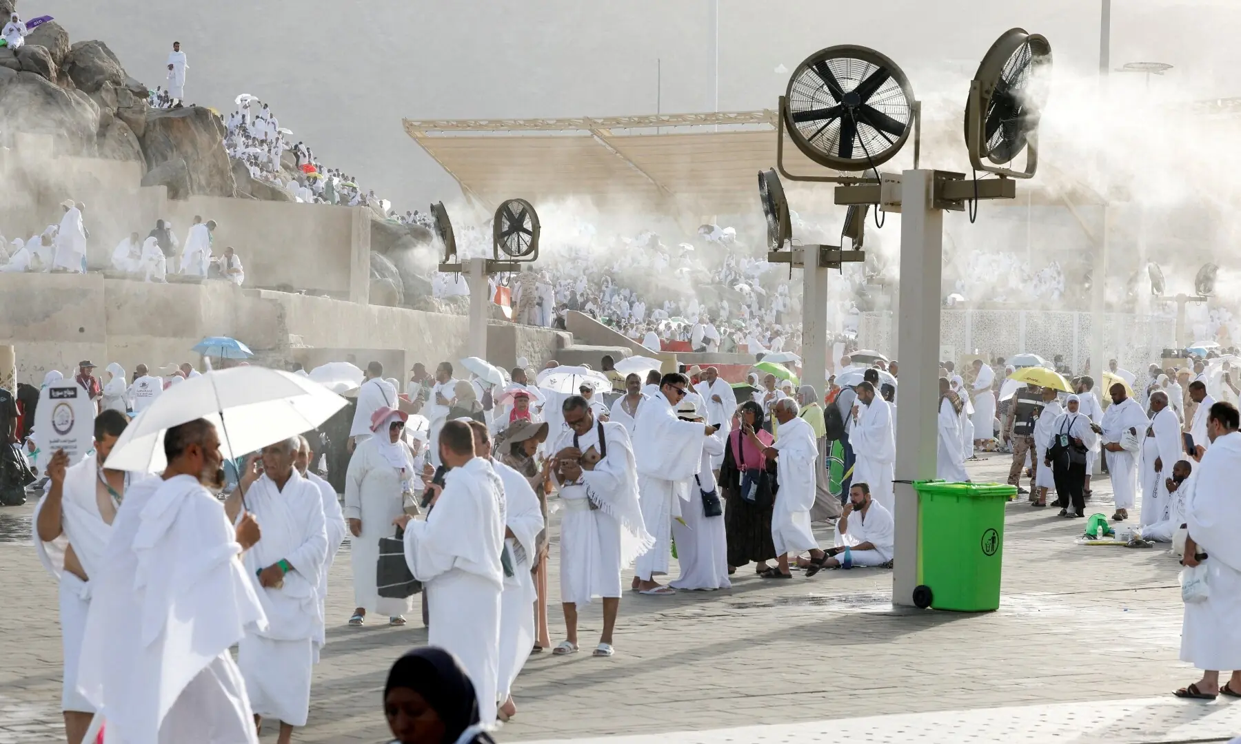 Muslim pilgrims gather near misting fans at Mount of Mercy on the plain of Arafat during Haj, outside the holy city of Makkah, Saudi Arabia, May 26, 2026. —Reuters