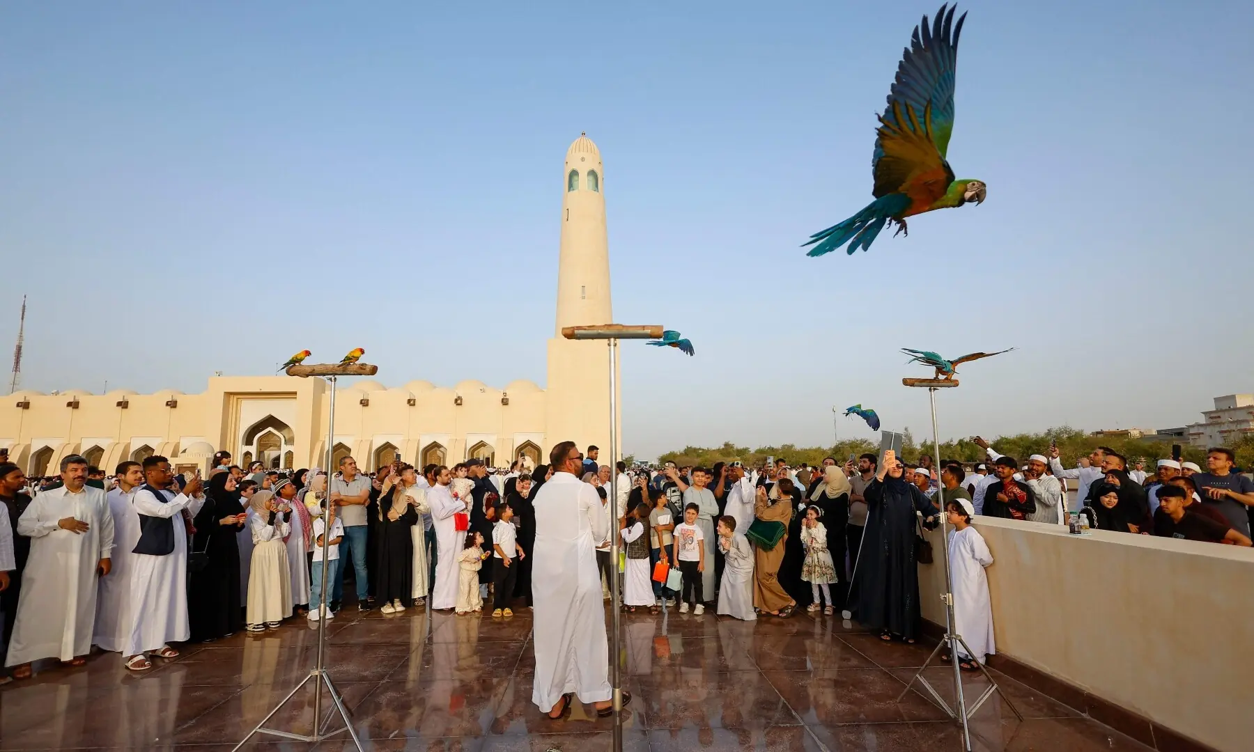 Muslims gather in front of the Imam Muhammad ibn Abd al-Wahhab Mosque in Doha on May 27, 2026, to celebrate the first day of Eid al-Adha. — AFP