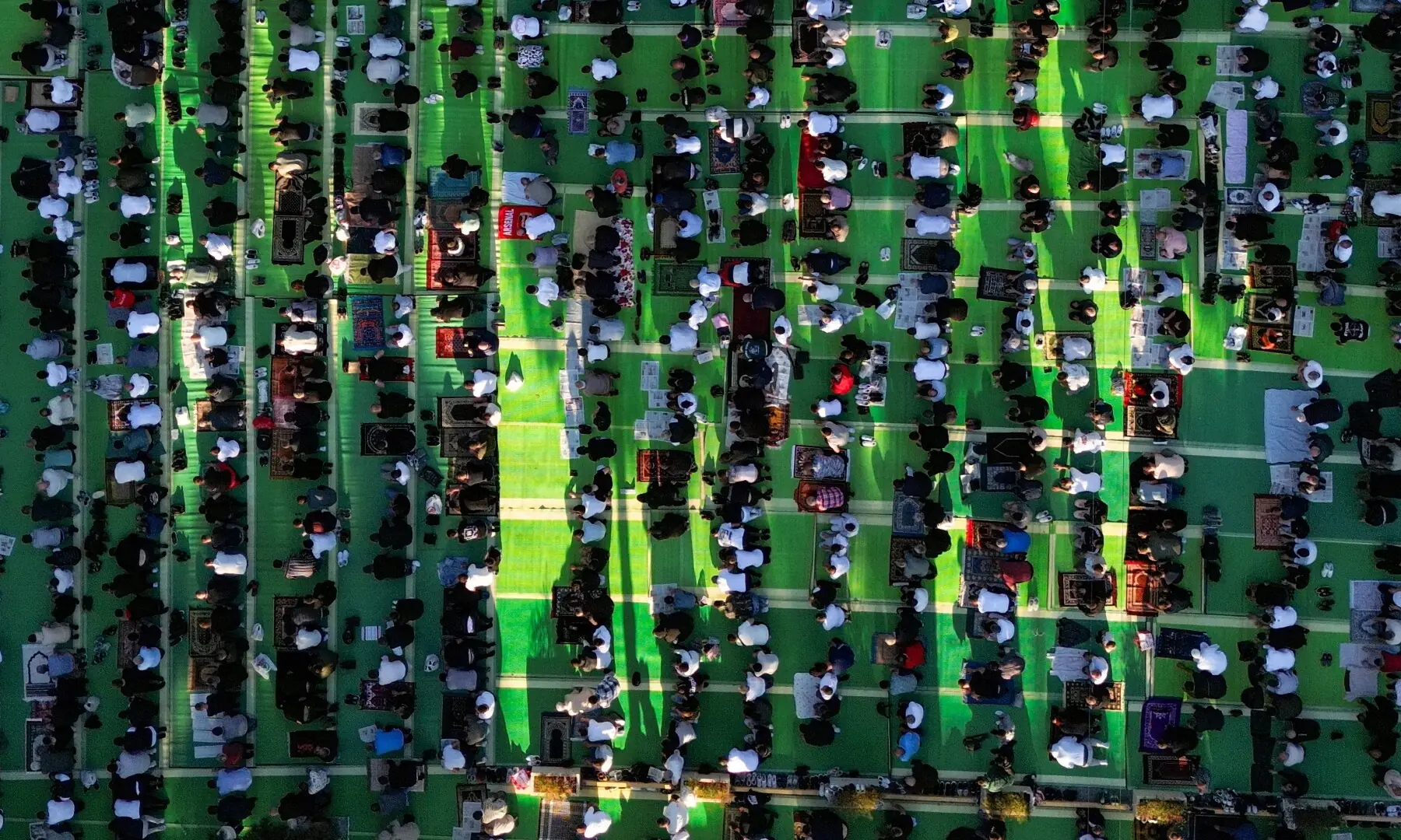 A drone view shows Albanian Muslims attending morning prayers during Eid al-Adha celebrations at the main boulevard, in Tirana, Albania, May 27. — Reuters
