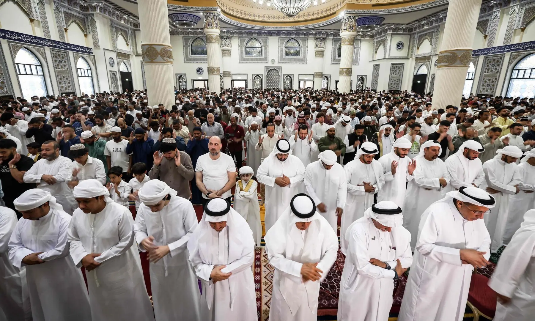 Muslims perform a special morning prayer marking the start of Eid al-Adha, the Feast of Sacrifice, at the Al Farooq Omar Bin Al Khattab Mosque in Dubai on May 27. — AFP
