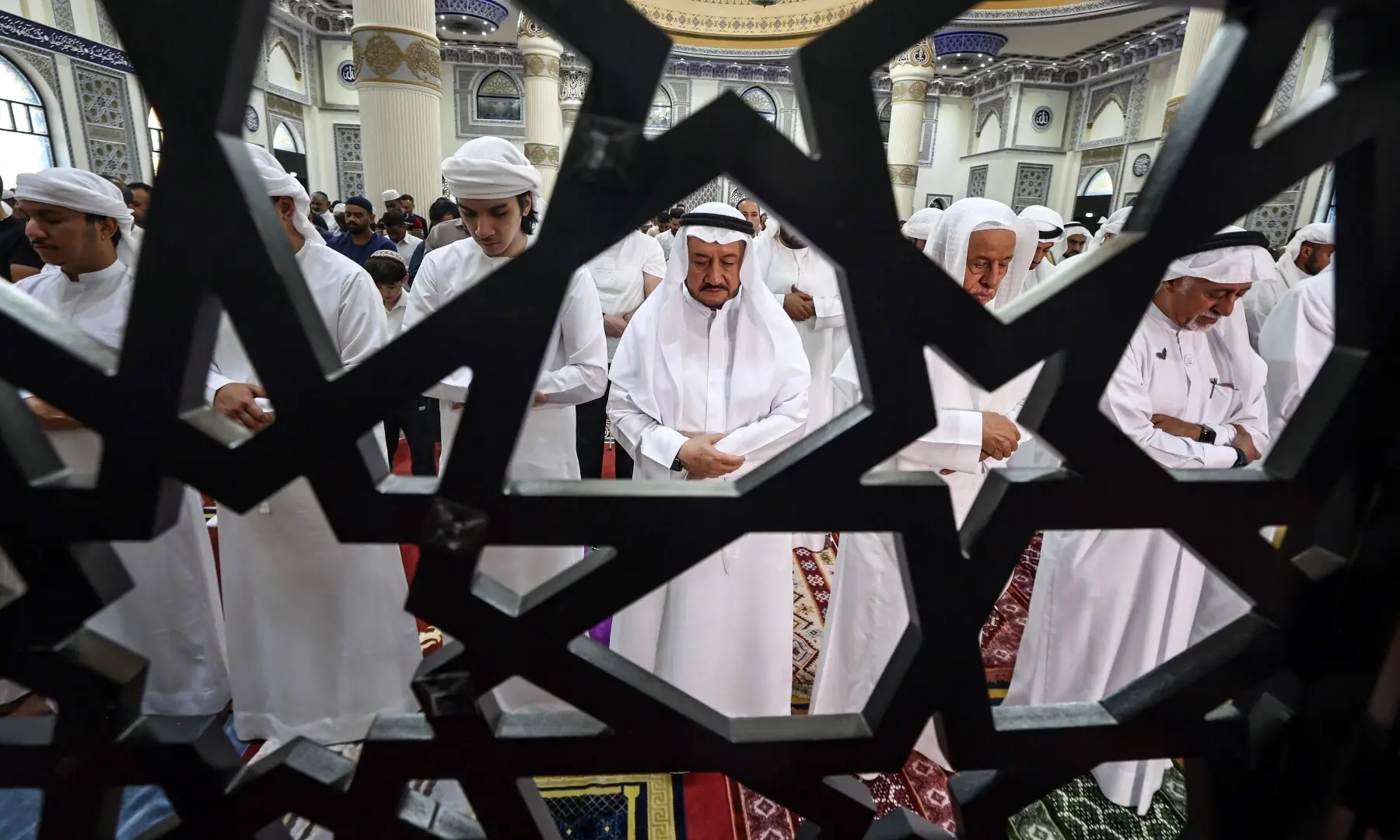 Muslims perform a special morning prayer marking the start of Eid al-Adha, the Feast of Sacrifice, at the Al Farooq Omar Bin Al Khattab Mosque in Dubai on March 27. — AFP