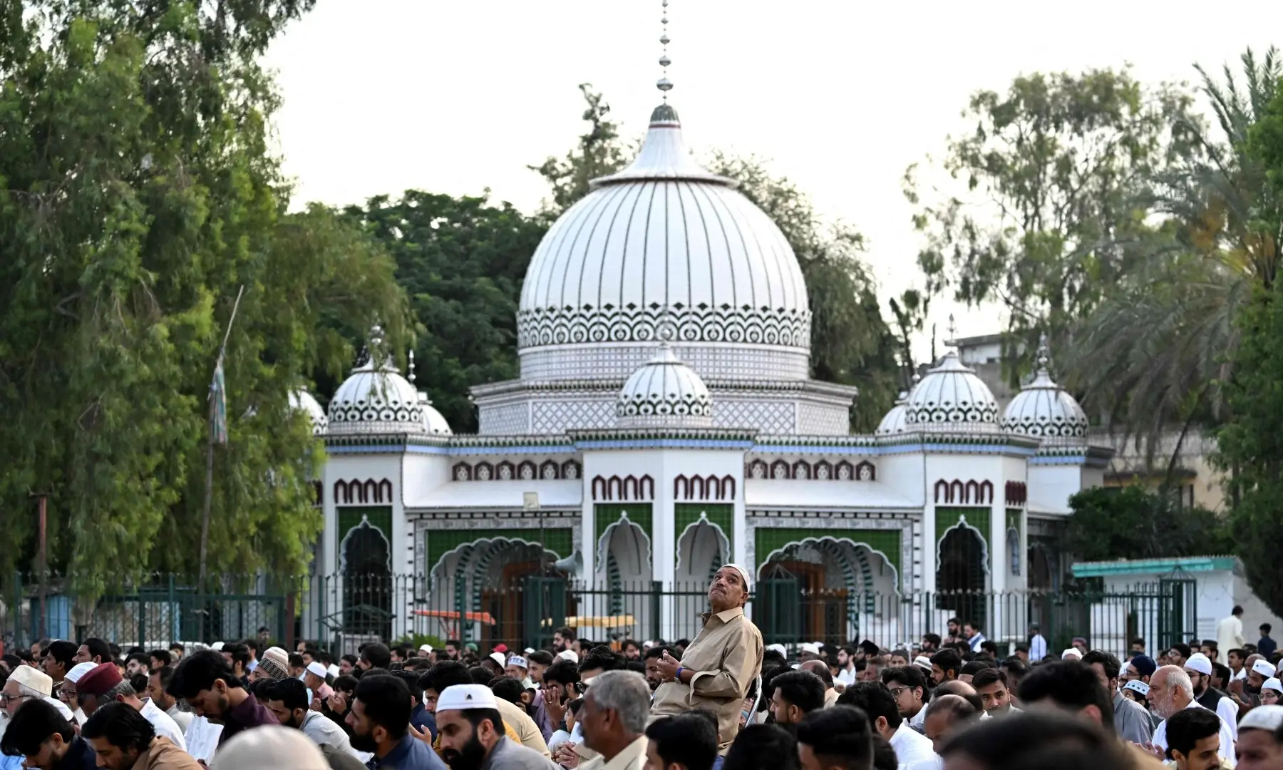 Muslim devotees offer Eid al-Adha prayers at the Eidgah ground in Rawalpindi on May 27. — AFP