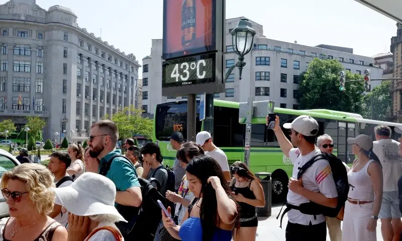 People stand next to a temperature panel with a reading of 43 degrees Celsius during a spring heatwave in Bilbao, Spain on May 27, 2026. — Reuters People stand next to a temperature panel with a reading of 43 degrees Celsius during a spring heatwave in Bilbao, Spain on May 27, 2026. — Reuters