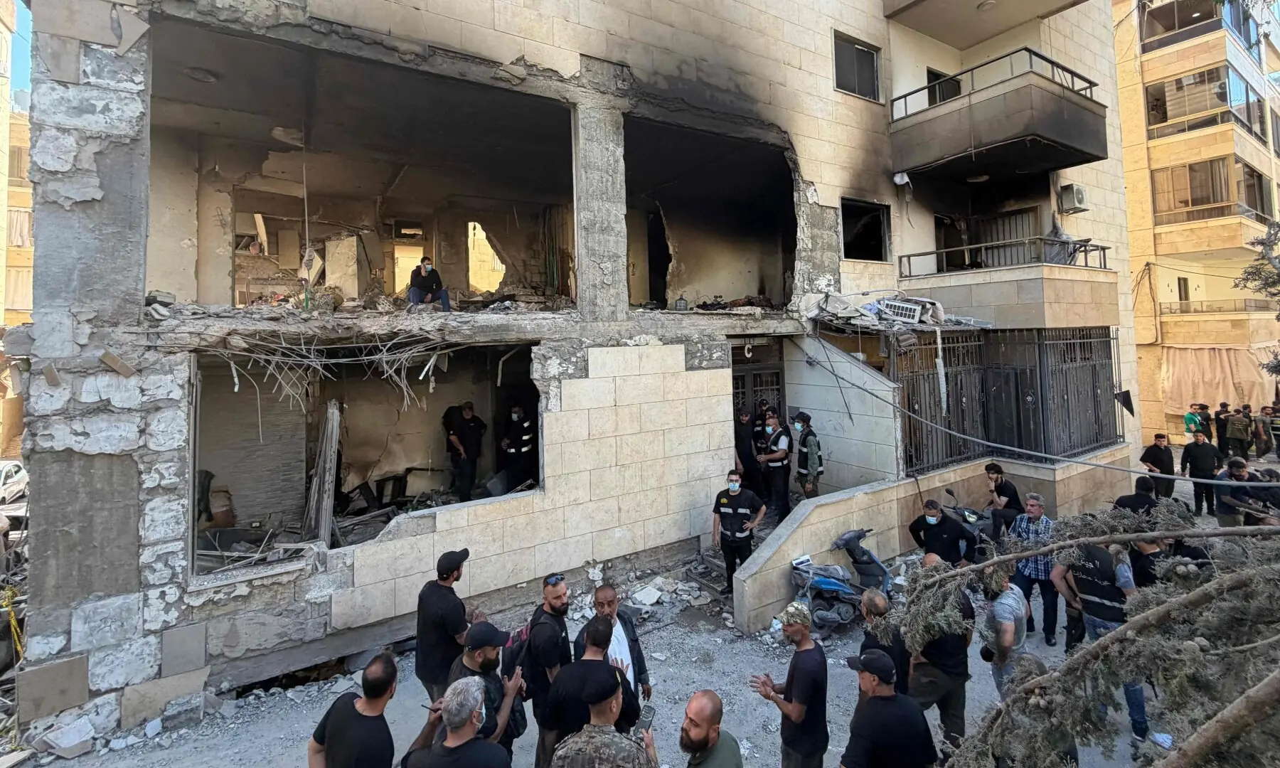 Rescue workers and local residents inspect the damage to a building following an Israeli air strike in the Choueifat area, south of Beirut on the outskirts of the capital&rsquo;s southern suburbs in Lebanon on May 28, 2026. &mdash; AFP