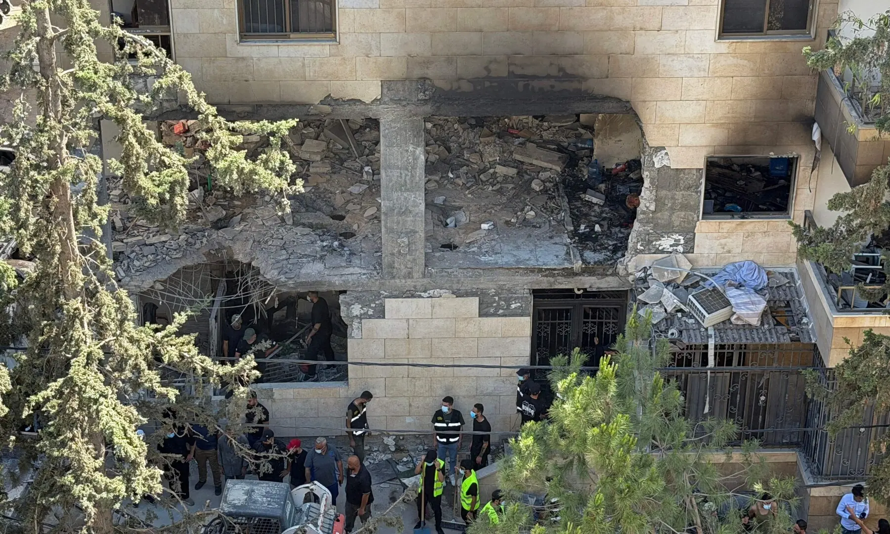 Rescue workers and local residents inspect the damage to a building following an Israeli air strike in the Choueifat area, south of Beirut on the outskirts of the capital&rsquo;s southern suburbs in Lebanon on May 28, 2026. &mdash; AFP