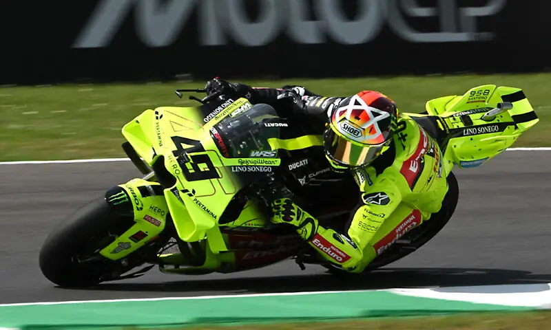MUGELLO: Pertamina Enduro VR46 Raging Team’s Italian rider Fabio Di Giannantonio steers his motorbike during the second practice session ahead of the Italian Moto GP Grand Prix at Mugello circuit on Friday.—AFP MUGELLO: Pertamina Enduro VR46 Raging Team’s Italian rider Fabio Di Giannantonio steers his motorbike during the second practice session ahead of the Italian Moto GP Grand Prix at Mugello circuit on Friday.—AFP