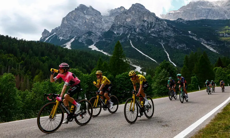 (L to R) TEAM Visma Lease a Bike’s Danish rider Jonas Vingegaard, Victor Campenaerts of Belgium and Davide Piganzoli of Italy cycle in the descent of Passo Duran during the 19th stage of the Giro d’Italia, between Feltre and Alleghe, on Friday.—AFP (L to R) TEAM Visma Lease a Bike’s Danish rider Jonas Vingegaard, Victor Campenaerts of Belgium and Davide Piganzoli of Italy cycle in the descent of Passo Duran during the 19th stage of the Giro d’Italia, between Feltre and Alleghe, on Friday.—AFP