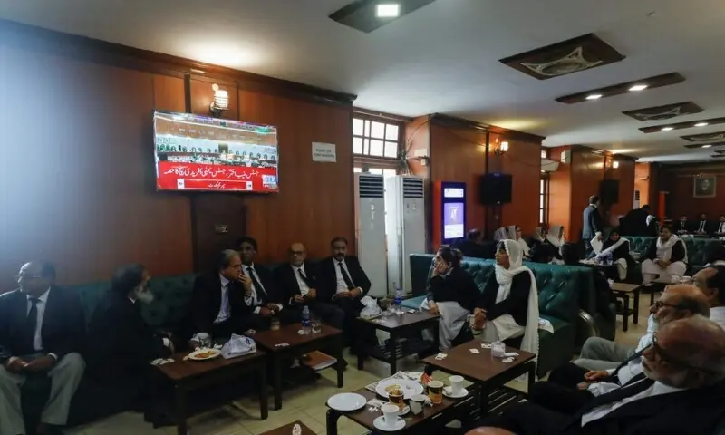 Lawyers sit as a television screen dispays the live broadcast of the proceeding from the Supreme Court, at the Sindh High Court Bar Association in Karachi on September 18, 2023. — Reuters Lawyers sit as a television screen dispays the live broadcast of the proceeding from the Supreme Court, at the Sindh High Court Bar Association in Karachi on September 18, 2023. — Reuters